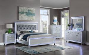 Silver Queen Bed:
Headboard w/Lights (Box 1 of 3)
Footboard w/Slats (Box 2 of 3)
King or Queen Rails (Box 3 of 3), Silver Dresser w/Lights, Silver Mirror w/light, Silver Chest w/Lights, Silver Nightstand w/Light